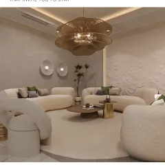 We design lounges that invite you to stay. This Japandi-inspired space uses curved sofas, a neutral palette, and a stunning layered chandelier to create an atmosphere of calm and quiet elegance.