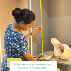 Precision is key to a perfectly functional wardrobe. Here, I am taking meticulous measurements to ensure every shelf and rod is spaced correctly for the client's specific clothing. Every inch counts when creating a space that is both beautiful and practical.