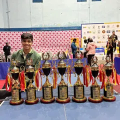 A champion's haul. Aakash K J with his numerous trophies after being selected to represent Team India in upcoming World Table Tennis tournaments, a significant milestone for any player.