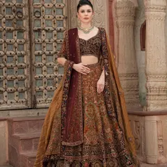 Another shot from our "Bridal Saga" campaign. The rich velvet dupatta adds a touch of luxury to this beautifully crafted bridal lehenga.
