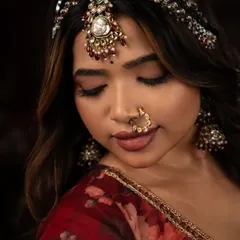 A close-up of the makeup from my Heeramandi project. The eyes are softly smoked, the skin is luminous, and the lips are defined in a deep, romantic shade.