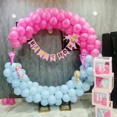This is a full ring balloon frame I created for a gender reveal baby shower. The top half is pink and the bottom half is blue, with a "Baby Shower" banner in the middle and matching B-A-B-Y boxes on the side.