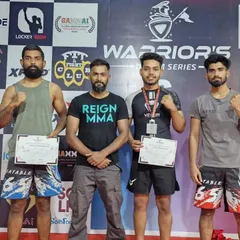 We learn from every fight, win or lose. This photo from the Warrior's Dream Series shows the reality of competition, where we faced illegal strikes and tough decisions but came away with invaluable experience for the next battle.
