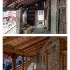 The museum's upper corridor was transformed from a dark, dilapidated passage into a bright, welcoming gallery, showcasing the restored stone and new woodwork.