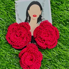 My classic red rose crochet jewelry set, featuring a floral pendant necklace and matching earrings. Each piece is carefully handcrafted from soft cotton thread, offering a bold and romantic look.