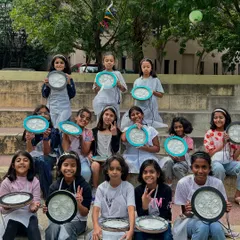 The proud artist club. This is the best moment, when all the kids get to show off the amazing moon lamps they created and customized themselves.