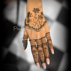 A simple yet stunning back-hand design with a lotus vine. The finger details are kept minimal for an elegant and modern look.