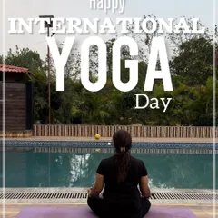 A moment of quiet meditation by the pool. Finding stillness in a beautiful, natural environment is a core part of my wellness philosophy. Happy International Yoga Day.