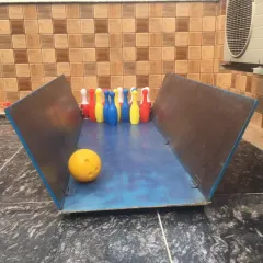 I also offer a variety of tabletop games for party entertainment. This mini bowling alley is easy to set up anywhere and provides fun for guests of all ages.