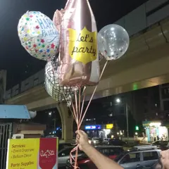 Ready to get the party started? Our helium-filled balloon bouquets, like this one with a champagne bottle and disco ball foil, are perfect for any celebration. We can deliver them right to your party in Kharghar.