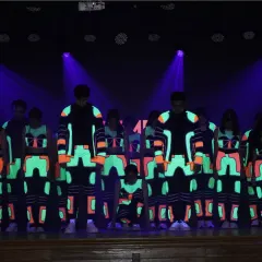 We love getting creative with our performances. This glow-in-the-dark hip hop routine was a huge hit, combining cool choreography with stunning visual effects to create a truly memorable stage act.