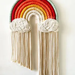This rainbow features a warm, fiery color palette of reds, oranges, and yellows. It's a perfect piece to add a vibrant and energetic touch to a child's playroom or bedroom.