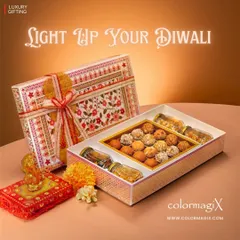 Light up your Diwali with our exquisite floral print hamper. It comes filled with an assortment of traditional laddus and premium dry fruits in beautiful glass jars, complete with a small Ganesha idol for blessings.