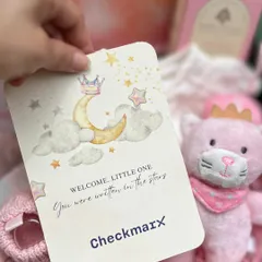 The personalized stationery is a key part of the story. This card, with its message "Welcome, little one, you were written in the stars," perfectly complements the celestial theme.