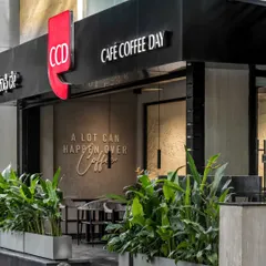 We revitalized the iconic Café Coffee Day on BEL Road by creating an inviting facade that blends modern design with Bangalore's lush greenery. The open, airy entrance is a glimpse into the refreshed, memorable coffee experience we designed within.