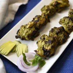 For our non-vegetarian patrons, we offer this succulent Chicken Kairee Tikka. Tender chicken pieces are marinated in a tangy raw mango paste and spices, creating a perfect balance of flavors.