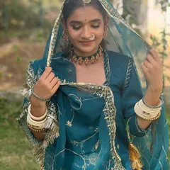 Embracing the royal colours of Rajasthan. This look features traditional Rajasthani jewellery and makeup that is both vibrant and elegant.