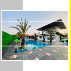 A poolside view of the Rock Villa, showcasing the interplay of the building's structure, the inviting water, and the surrounding palm trees. My design aimed to create a perfect setting for leisure and events.