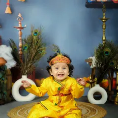 Celebrating Janmashtami with a special Krishna-themed photoshoot. This little one's joyful expression is what I strive for by playing and engaging with the kids.