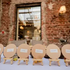 Personal touches make guests feel special. At the candle-making station, each guest had a personalized stand to display their creation, adding a thoughtful and organized element to the activity.