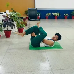 Demonstrating some floor exercises during our workshop at Somerville School. It's important to show that you can work out anywhere.