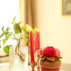 Another view of the pink vignette, with the candlelight reflecting softly. It’s moments like these that make a home feel warm and safe.