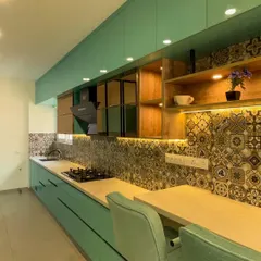 The kitchen features a mix of closed upper cabinets and open wooden shelves with integrated lighting. This provides both concealed storage and a space to display decorative items.