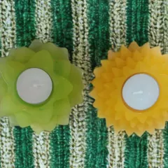 Here you can see two different T-light holder designs side-by-side. I can create them in any color you like, such as this leafy green and sunny yellow, to perfectly match your wedding or event color palette.