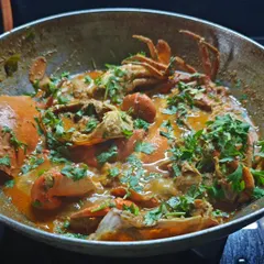 My Malvani Crab Curry is a messy, hands-on, and incredibly rewarding experience. The secret to its spectacular taste is the authentic Malvani masala I use, which makes the sweet crab meat sing.