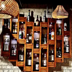 Our unique heart-shaped bar shelf, stocked and ready for our BYOB guests.