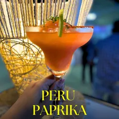 My Peru-Paprika mocktail is a slushy blend of sweet guava and spicy paprika, served in a chili-rimmed glass. It's a fiery and refreshing drink that always impresses.