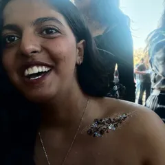 A delicate floral branch painted on the shoulder, accented with glitter that catches the light beautifully. This is a popular choice for parties and weddings.