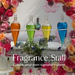 Another beautiful fragrance stall setup, this time with a vibrant floral arch. We can tailor the design of our interactive stations to perfectly match the overall theme and decor of your event.
