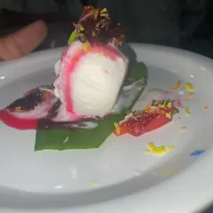 My signature Paan Vanilla Ice Cream. A scoop of vanilla ice cream served on a fresh betel leaf with gulkand and colorful sprinkles.