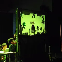 Storytelling takes many forms here. Our children's workshops explore diverse theatrical arts, including the enchanting world of shadow puppetry. The kids learn to create characters and narratives using light and shadow, a truly magical experience.