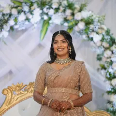 A beautiful portrait of the bride at her reception. The makeup is flawless, and the soft waves in her hair complete this romantic look.