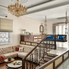 This view of the sunken living room at 'Mina Nivas' captures the home's unique play of volumes. The ornate wrought iron balustrades, a classic element of Calcutta homes, are a key feature that I loved experimenting with to bring a sense of history and nostalgia to the space.
