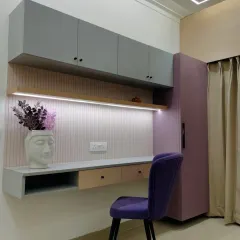 Another view of the modern study nook, highlighting the under-shelf lighting which provides excellent task illumination.