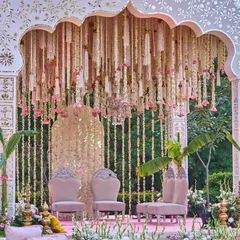 I believe a mandap should feel like a sanctuary. For this ceremony, I designed a structure that felt both grand and intimate, with a waterfall of tuberose and roses descending from a hand-detailed arch, framed by sacred banana leaves to bless the union.