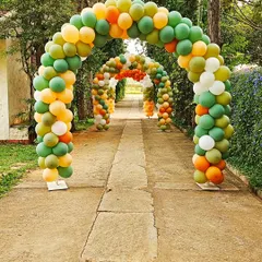 A series of large balloon arches creating a festive tunnel entrance. This is a great way to welcome guests and makes for a fantastic photo as they arrive at the celebration.