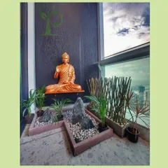 I designed this balcony as a personal Zen garden, a space for peace and meditation high above the city. The design integrates a calming Buddha statue, minimalist rock arrangements, and carefully selected plants like Areca palms to create a tranquil atmosphere.