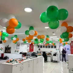 For national holidays, we provide professional and patriotic office decor. This setup for an Independence Day or Republic Day celebration features tricolor balloon bunches arranged across the office ceiling, creating a festive yet respectful environment.