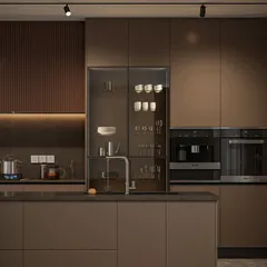 My Seamless Series is all about creating a kitchen that feels like poetry in motion. This design features handleless cabinets in earthy tones, a glass-fronted crockery unit, and fully integrated appliances. It’s a perfect example of how I blend minimalist aesthetics with high functionality for a truly premium experience.
