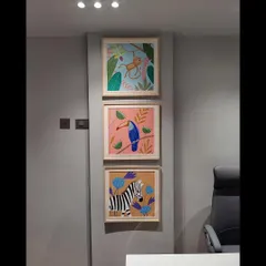 This custom set of three framed paintings was created for a child's room. The series features a playful monkey, a colorful toucan, and a friendly zebra, all designed with a fun, pastel aesthetic to create a cheerful atmosphere.