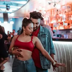 A close up from a social dance. Even in a crowded room, it's all about the connection you create with your partner in that moment.