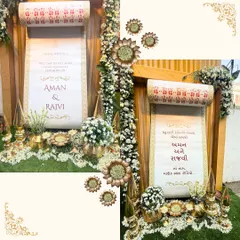 A personalized welcome scroll for the Kankotri Lekhan ceremony of Aman and Rajvi. This custom detail, surrounded by brass props and florals, adds a unique and personal touch to the event.
