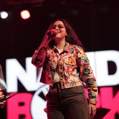 A close-up shot of me singing my heart out in Ahmedabad. Connecting with a live audience and feeling their energy is the best part of being a performer.