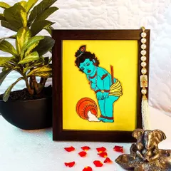 Here is Bala Krishna, the divine child, caught spilling a pot of buttermilk. This charming 9x10 inch framed painting is perfect for adding a touch of joy and innocence to your home.
