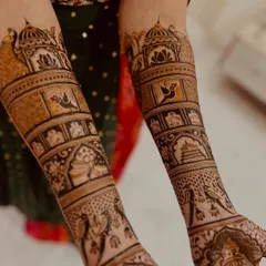 The beauty is in the details. I love creating full, symmetrical bridal designs that tell a story through intricate patterns, like the traditional jharokhas, birds, and sacred kalash motifs shown here.