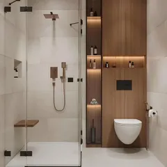 This modern bathroom design creates a spa-like feel at home. It features a glass-enclosed shower, a wall-mounted toilet, and a full-wall wooden panel with built-in, backlit shelves for storage and ambiance.